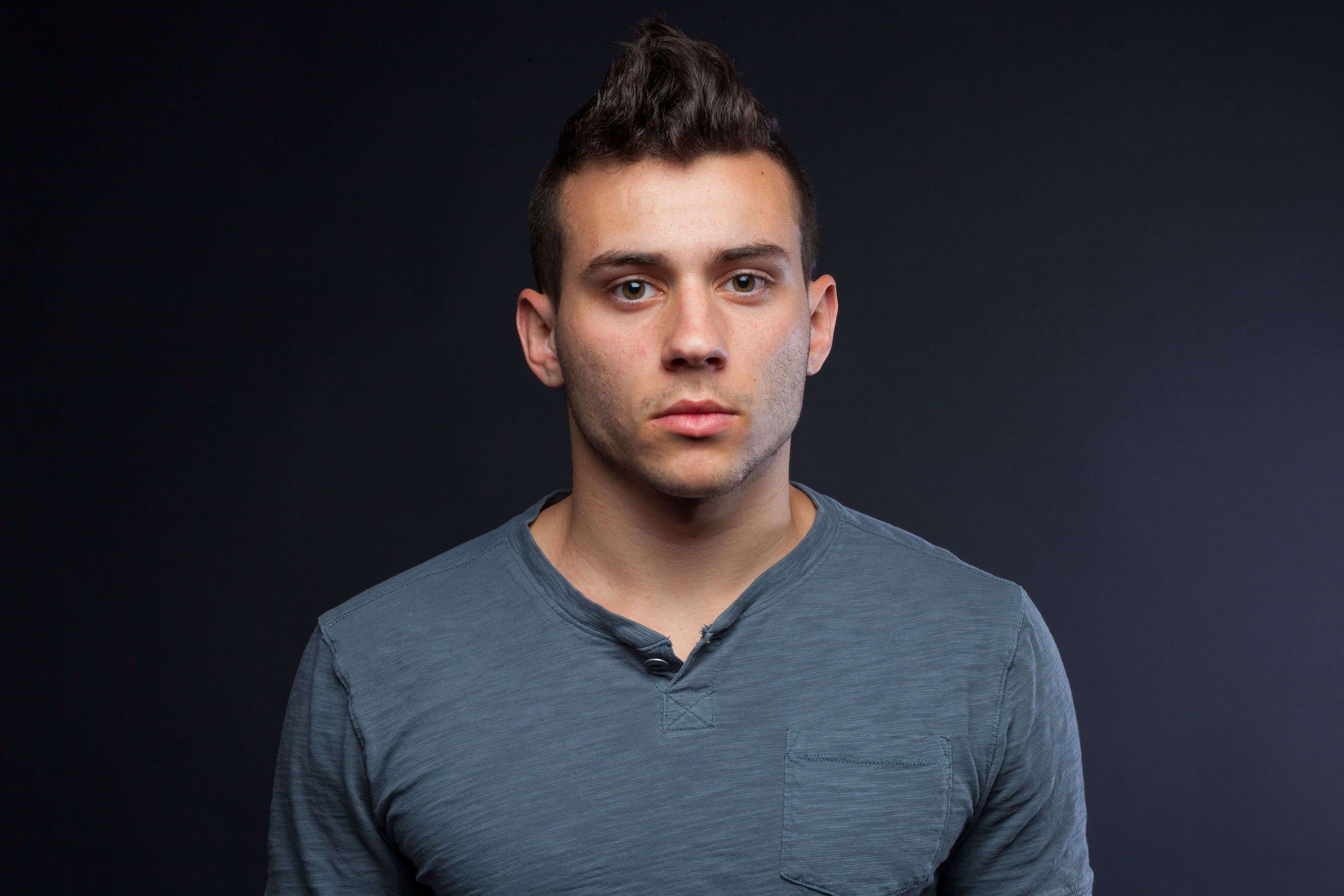 Studio portrait of Sam Morrison (@SamTheCobra) at Syracuse University