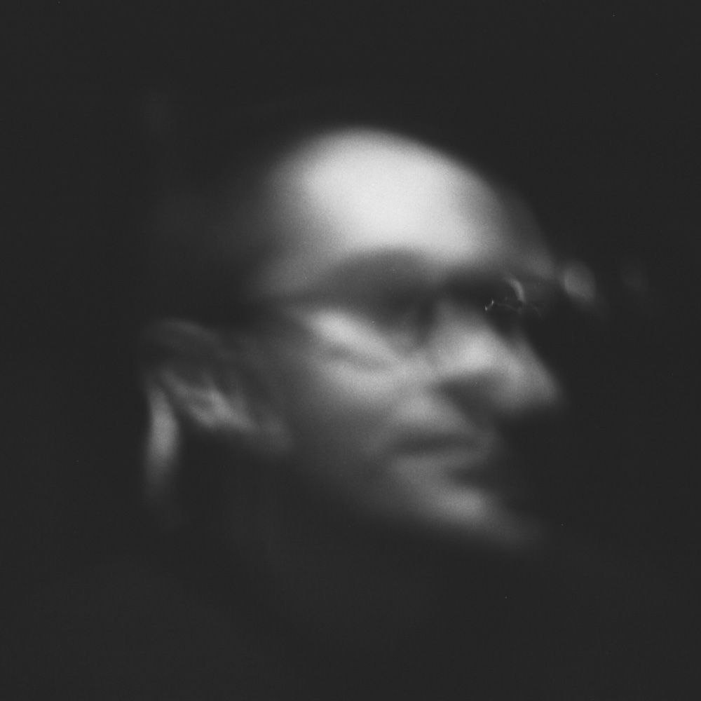 A portrait of me, Chris becker, in black-and-white shot on film